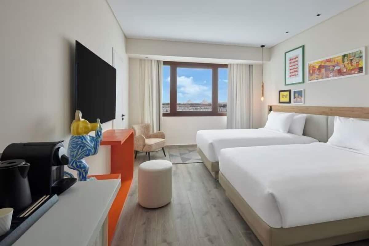 Egyptian cotton sheets, premium bedding, minibar, in-room safe