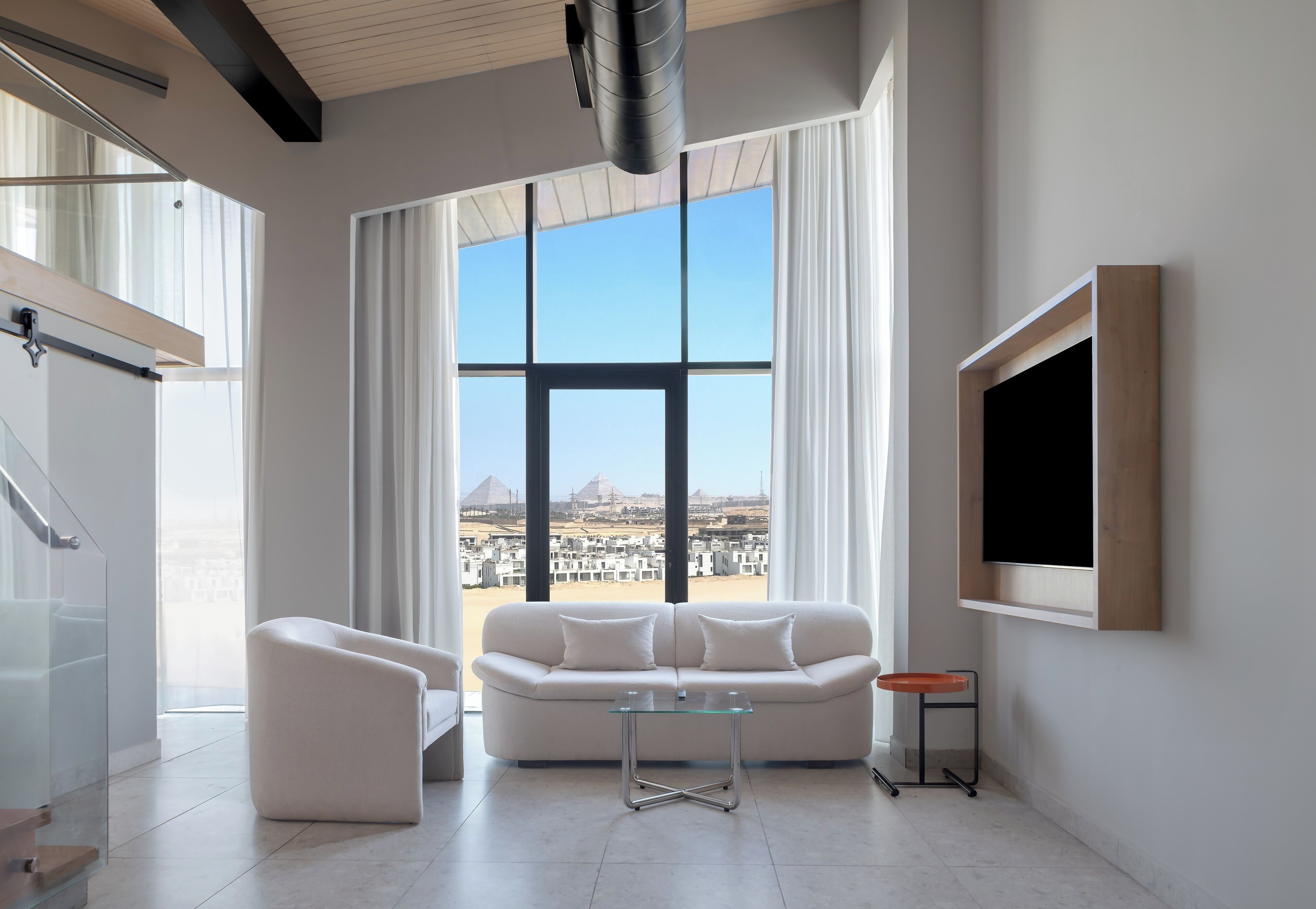 Premium Suite, 1 Bedroom (Loft) | Living area | 65-inch Smart TV with satellite channels, toys