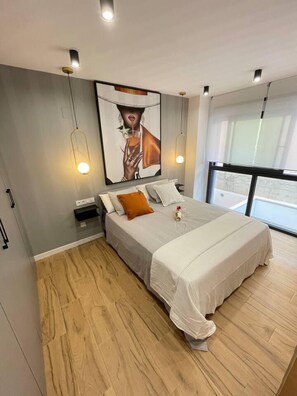 Apartament | 1 dormitori, planxa i posts de planxar, wifi gratuïta i roba de llit 