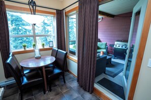 Interior - Relax with a Cozy Private Deck, Warm South Sun and Pool & Hot Tubs. (Canmore)