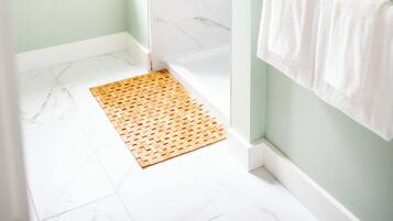 Shower, eco-friendly toiletries, hair dryer, towels