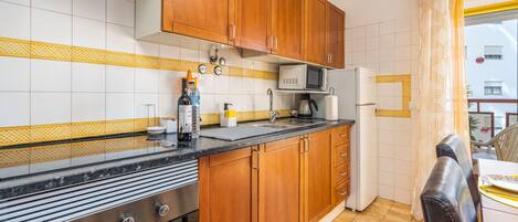 Fridge, microwave, oven, stovetop