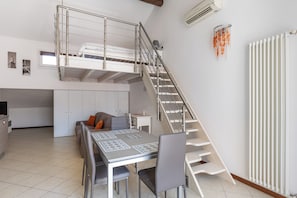 Apartment | Living area | 35-inch TV with digital channels