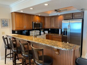 Fridge, microwave, oven, stovetop - Smyrna Beach Club 716B Comfort & Coastline Combined (New Smyrna Beach)