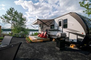 Exterior - RV 8   Lake view with double over double bunks for the kids! (Kenora)