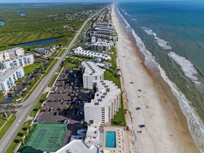 Enjoy stunning ocean views from this beachfront hotel, where guests can relax on the sandy beach or play a game of tennis.
