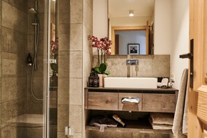 Shower, hair dryer, soap, shampoo