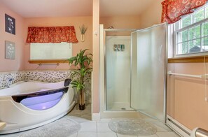 Jetted tub, hair dryer, towels, soap