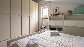 2 slaapkamers, een strijkplank/strijkijzer, wifi, beddengoed