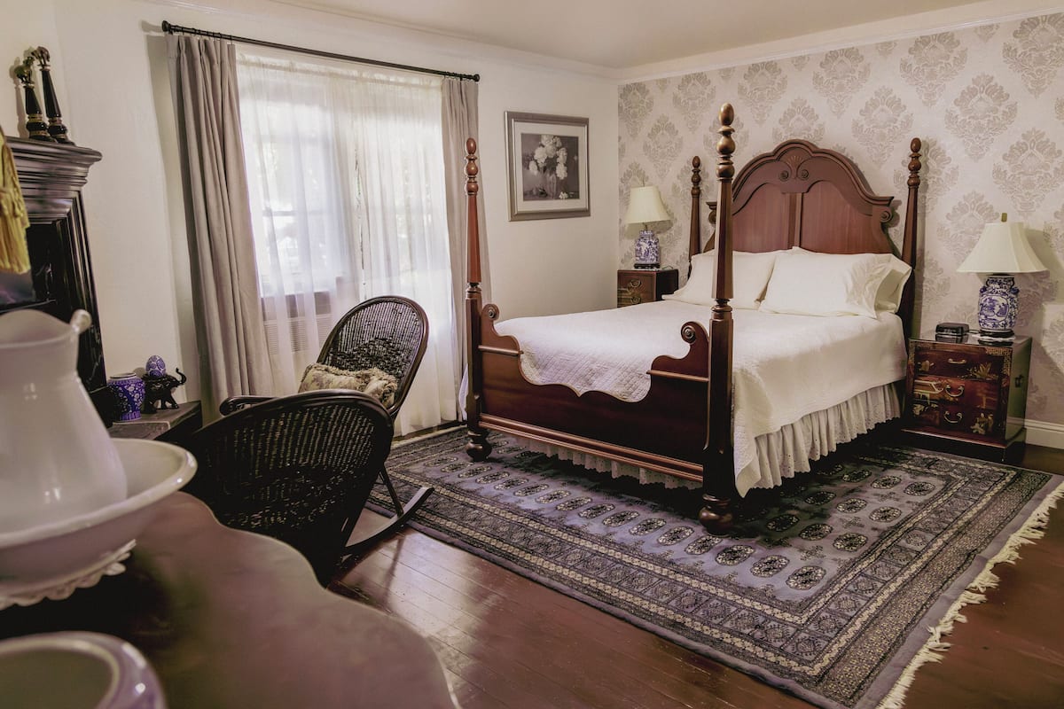 Deluxe Studio Suite | Premium bedding, down duvets, blackout curtains, iron/ironing board