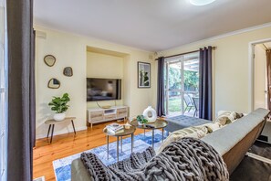Family House, 5 Bedrooms | Living area | Flat-screen TV