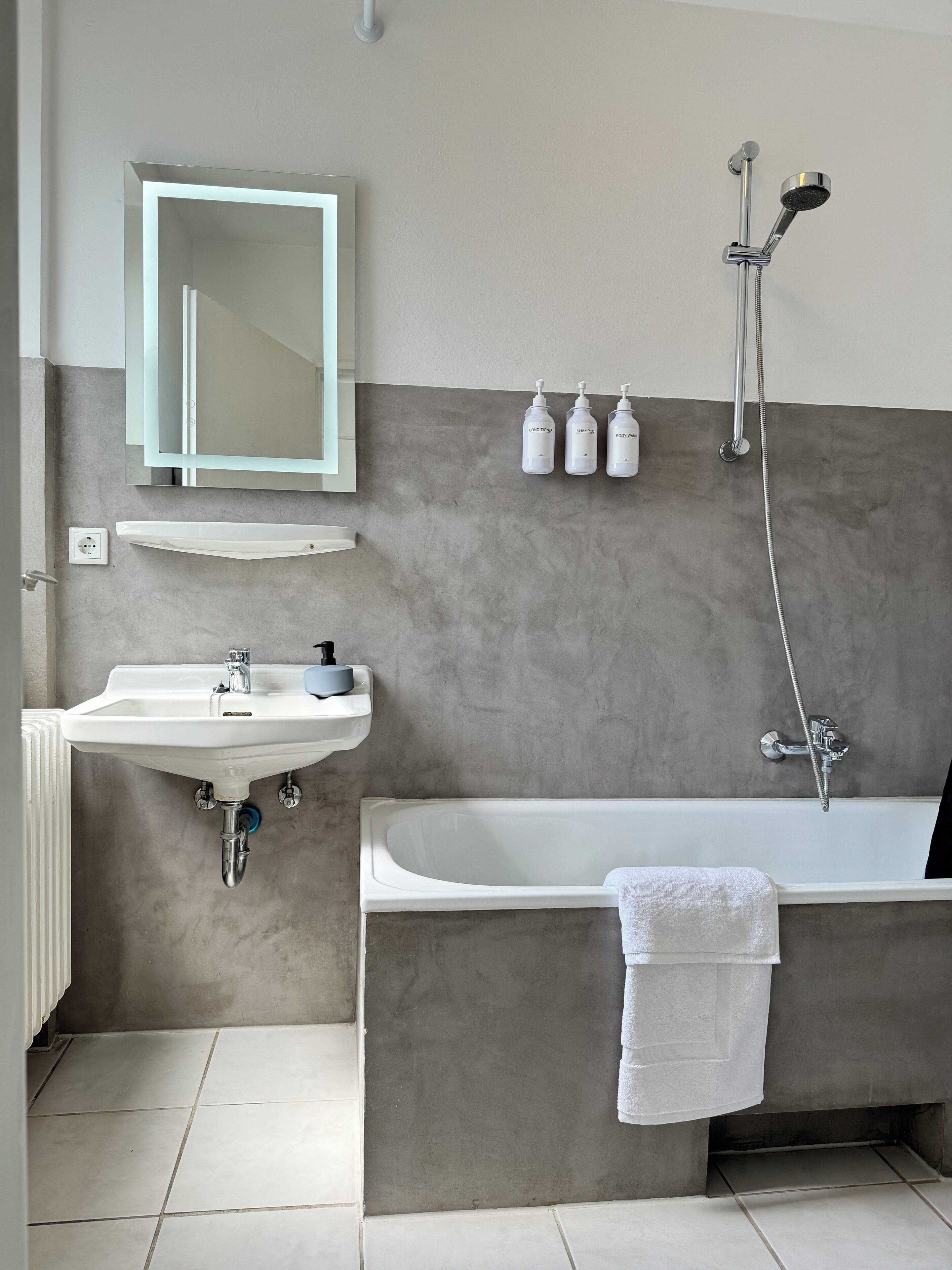 Hair dryer, towels, soap, shampoo