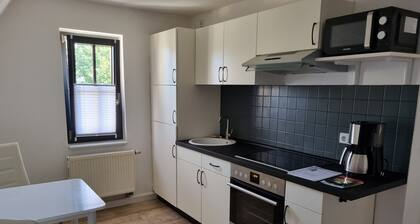 Ferienwohnung Windmühlensiedlung" mit privater Terrasse, Balkon und WLAN