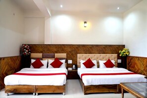 Deluxe Quadruple Room | Soundproofing, free WiFi, bed sheets - Goroomgo Hotel The Mountain Paradise Rewalsar (Balh)