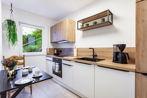 Réfrigérateur, four, plaque de cuisson, lave-vaisselle