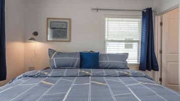 2 bedrooms, desk, iron/ironing board, travel crib