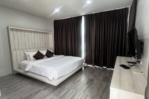 2 chambres, minibar, bureau, fer et planche à repasser