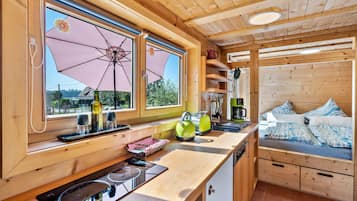 Fridge, stovetop, dishwasher, coffee/tea maker