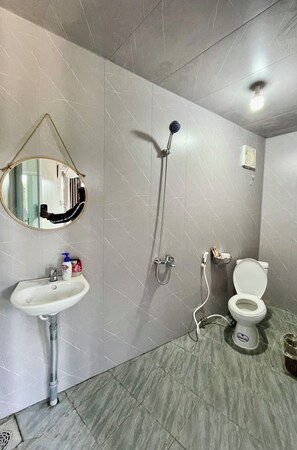 Panoramic Double Room Single Use, 2 Double Beds, Partial Ocean View | Bathroom | Shower, hair dryer, slippers, towels - San Hô Homestay (Phu Cat)