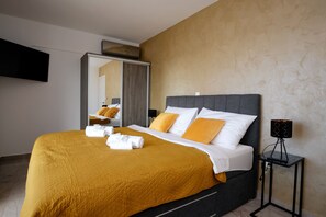 3 slaapkamers, een strijkplank/strijkijzer, gratis wifi, beddengoed