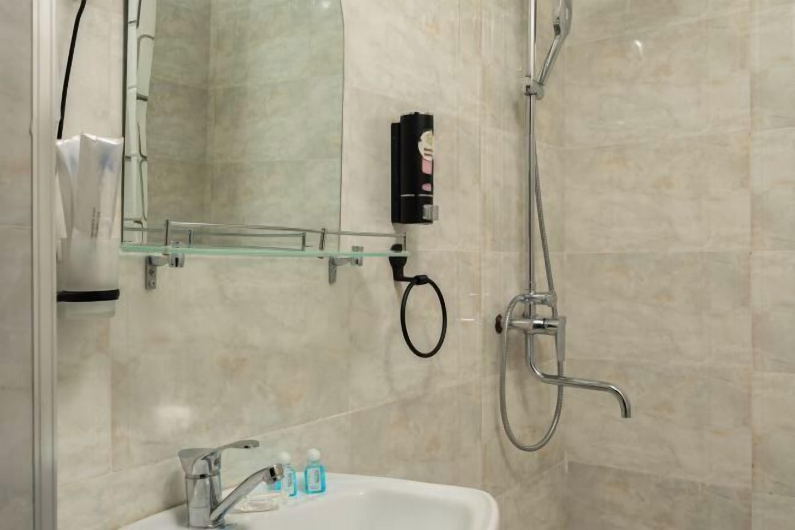 Bathroom | Hair dryer, slippers, bidet, towels