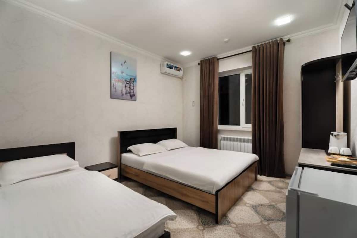 Premium bedding, down comforters, desk, laptop workspace