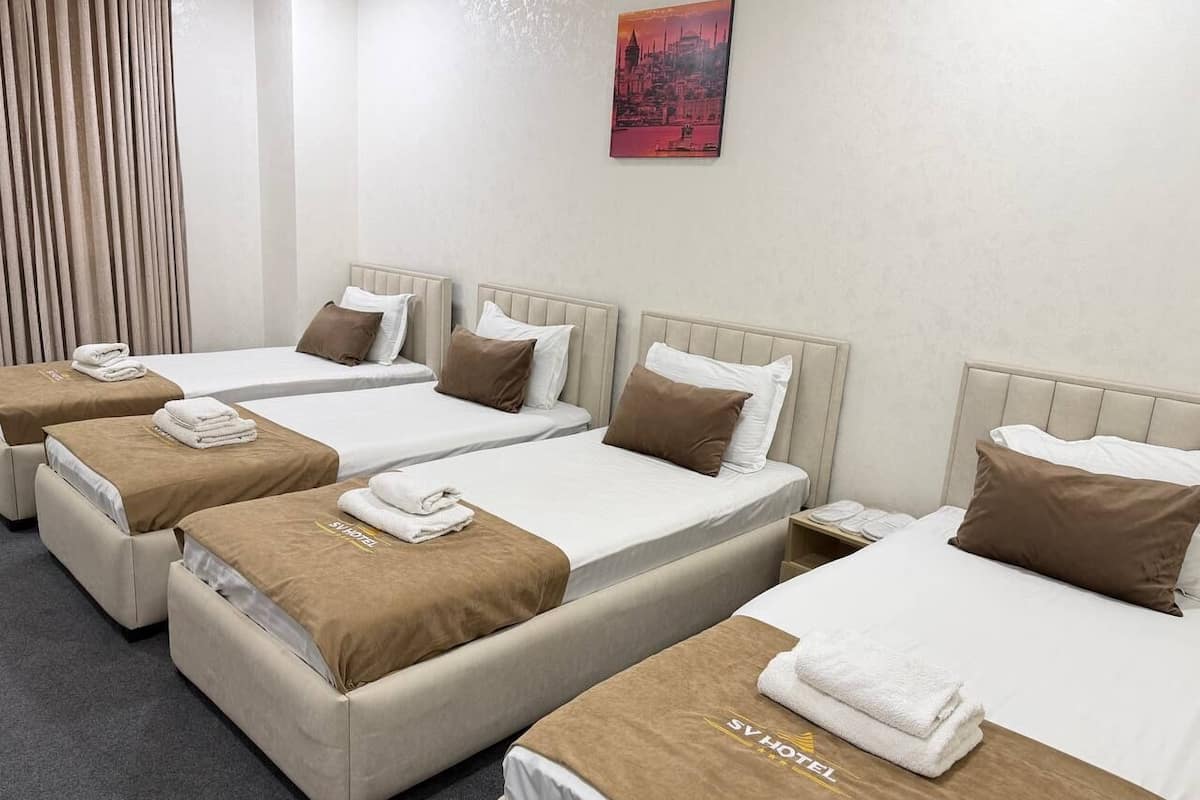 Business Quadruple Room | Premium bedding, down comforters, desk, laptop workspace