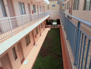 Quarto quádruplo família, vista para o jardim | Terraço/pátio