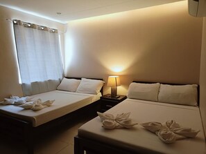 Family Quadruple Room, Garden View | Hypo-allergenic bedding, individually furnished, desk, free WiFi - Claytown Pension House (Dumaguete)