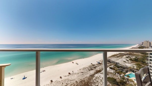 A balcony with a view of a beach and ocean. - Beachside II 4329 (Miramar Beach)