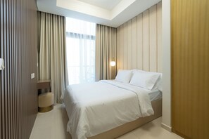 Apartemen Deluks, 2 kamar tidur, pemandangan kota | 2 kamar tidur, seprai premium, selimut bulu angsa, dan busa memori