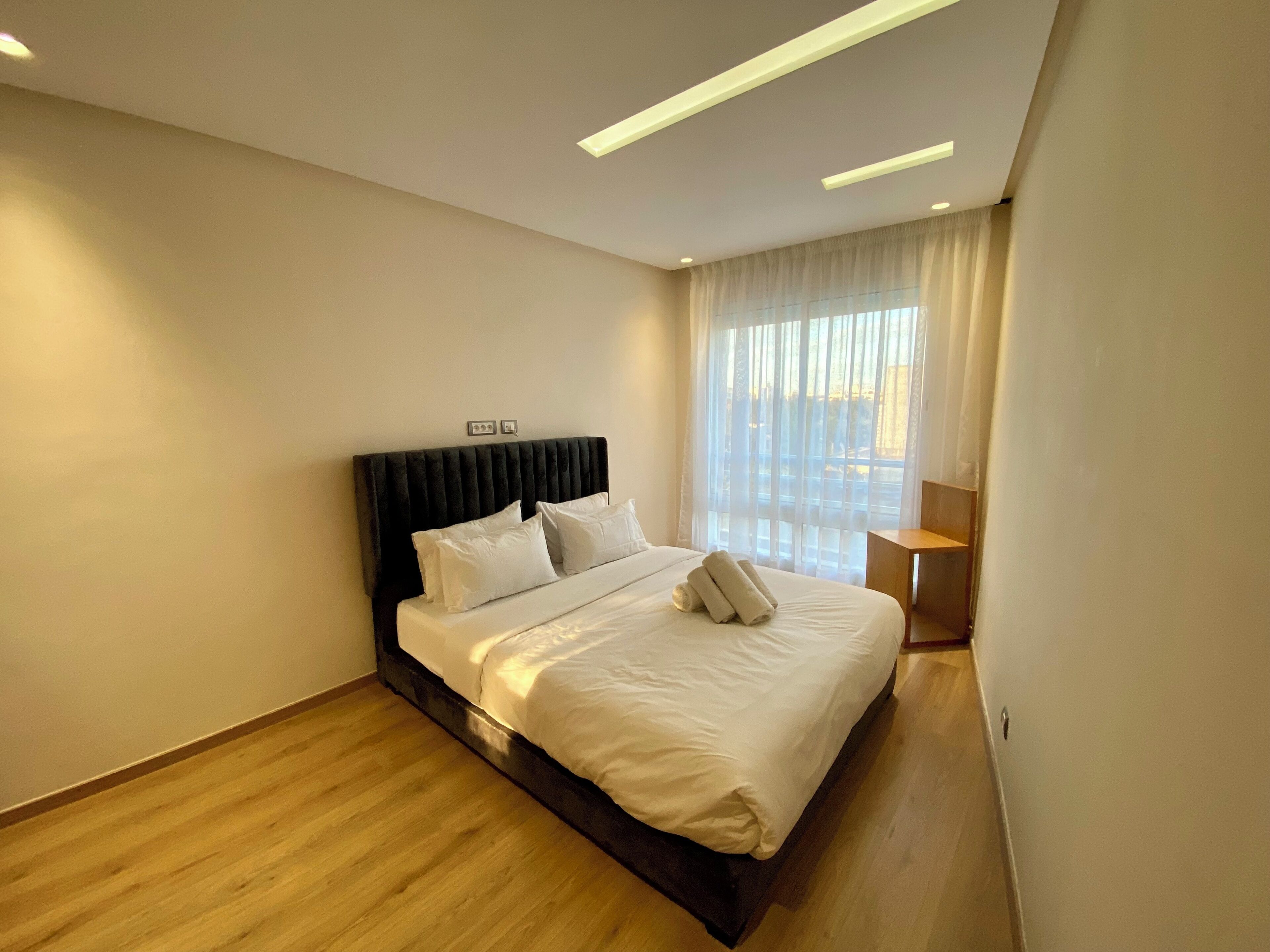Apartamento superior, balcón, vistas a la ciudad | 2 dormitorios, tabla de planchar con plancha, wifi gratis