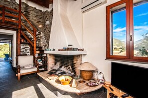 Standard House, Multiple Bedrooms (Baddi Di La Predda) | Living area | Fireplace - Baddi Di La Predda (Sassari)