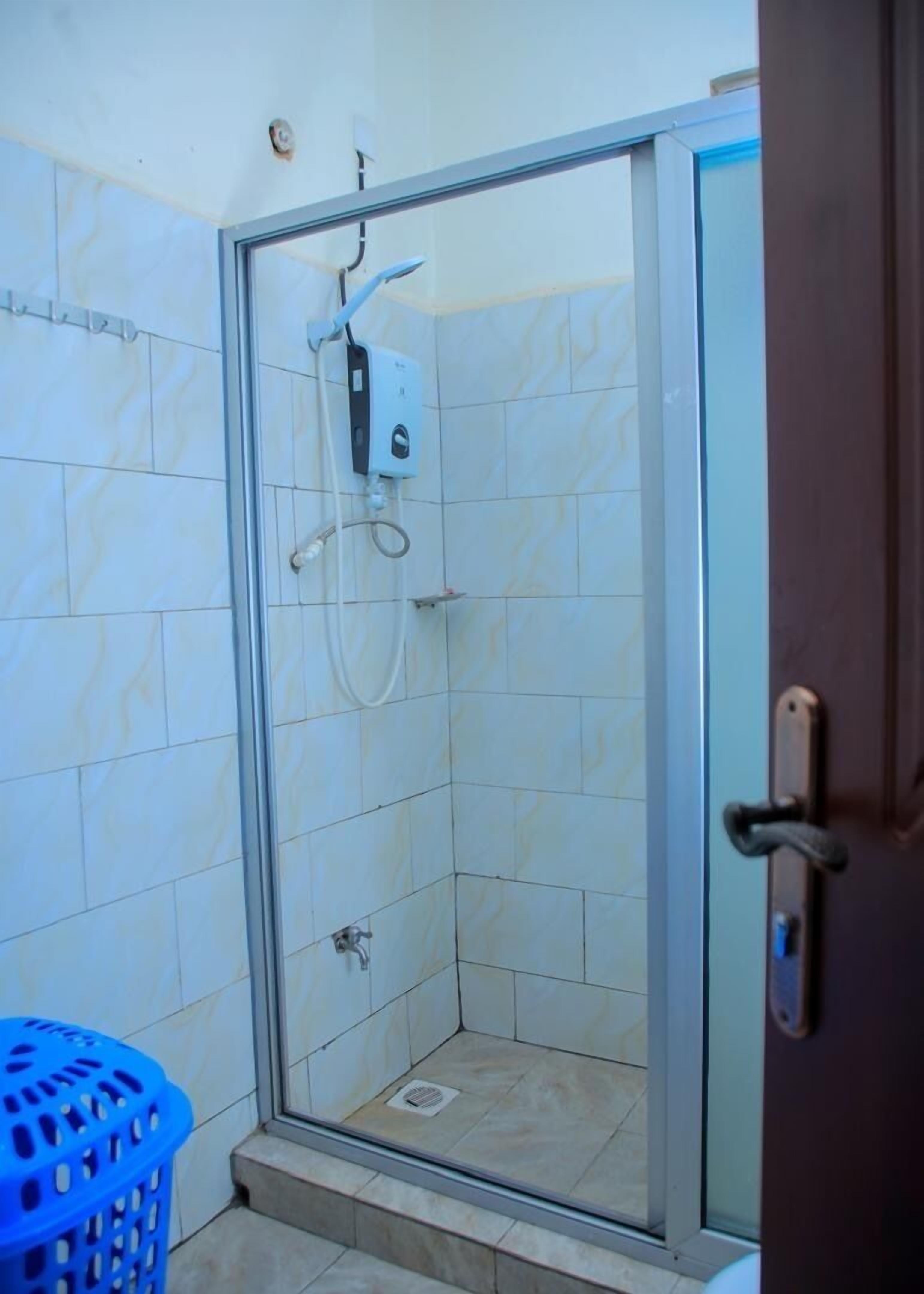 Shower, slippers, towels, soap