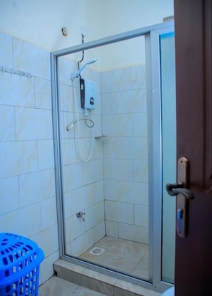 Classic Apartment, Balcony, City View | Bathroom | Shower, slippers, towels, soap
