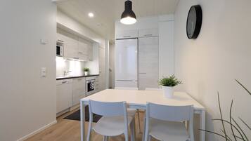 Apartamento standard | Área de estar | TV de tela plana