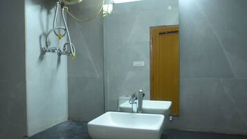 Luxury Room, City View | Bathroom | Shower, free toiletries, slippers, towels