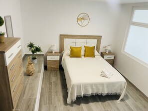 2 habitaciones, tabla de planchar con plancha y wifi gratis