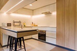 Microwave, oven, stovetop, coffee/tea maker