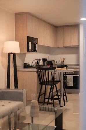 Fridge, microwave, oven, stovetop - Your Urban Oasis 1BR in Downtown Santiago (Santiago)