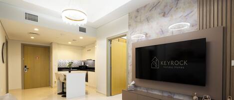 Deluxe Apartment, Balcony, City View | Living area | 50-cm Smart TV with digital channels