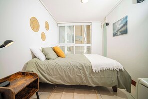 1 chambre, fer et planche à repasser, Wi-Fi, draps fournis