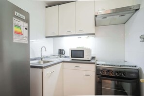 Fridge, microwave, oven, stovetop - Stylish 1BR in Las Condes w/Pool and Free Parking (Las Condes)