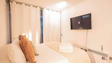 2 habitaciones, tabla de planchar con plancha, wifi y ropa de cama