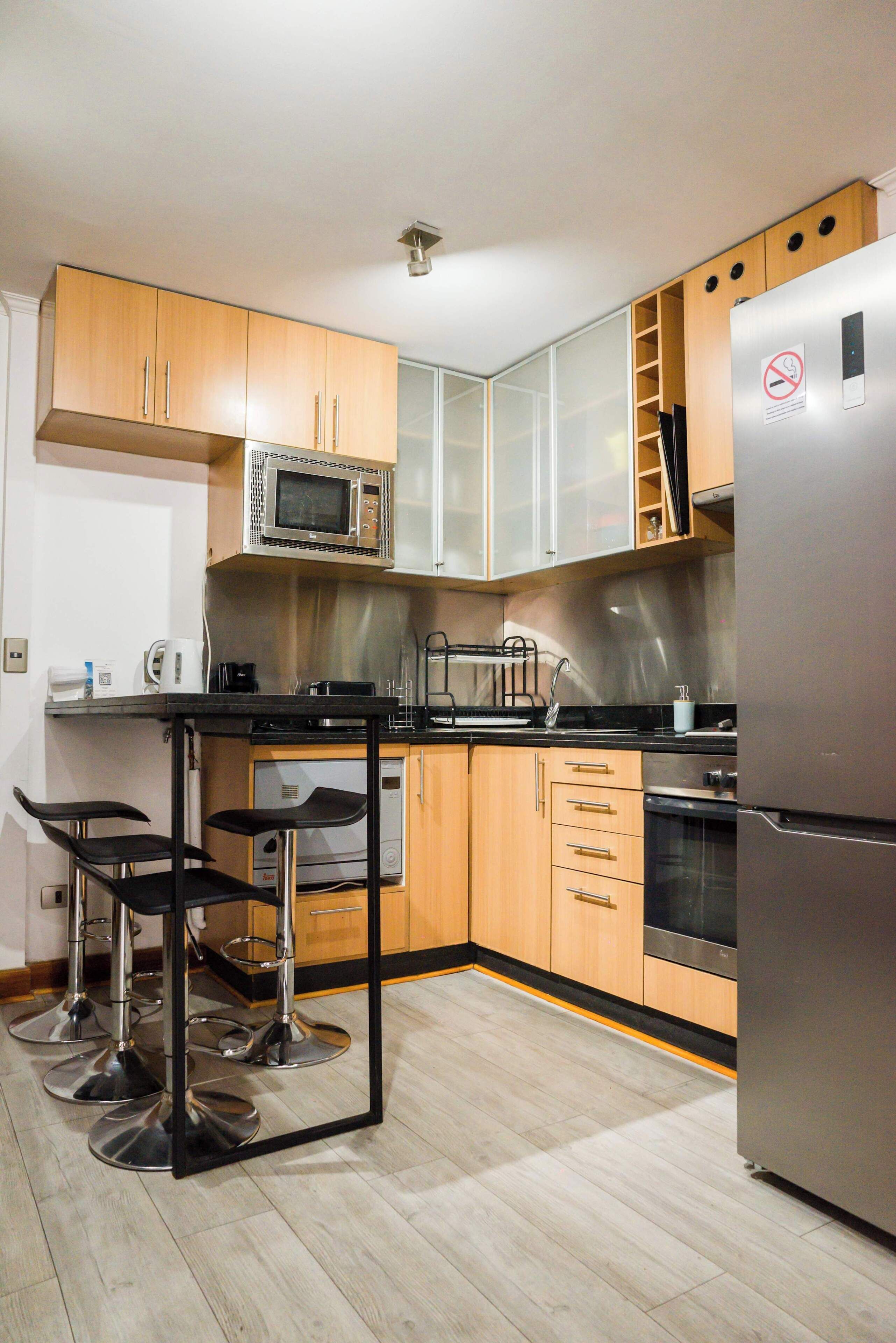 Coffee/tea maker, fridge, microwave, oven