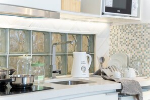Fridge, microwave, stovetop, electric kettle