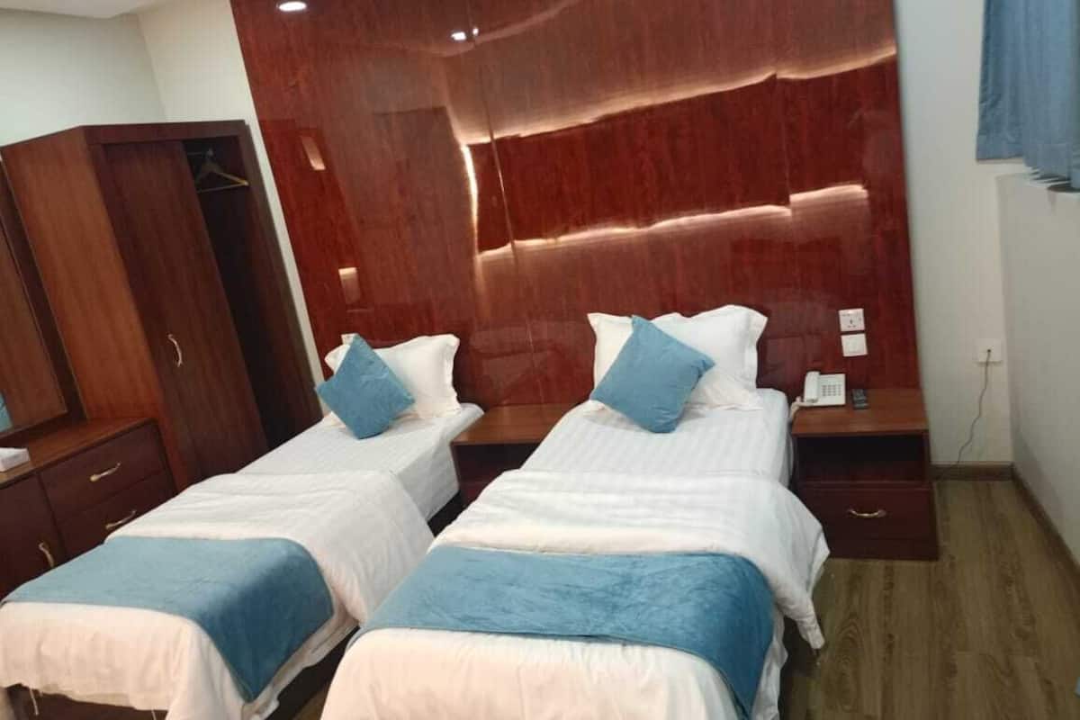 Deluxe Twin kamer | Donzen dekbedden, verduisterende gordijnen, geluiddichte muren