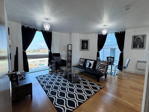 Tranquil Oasis surrounded by restaurants, shops, bars, and a multiplex cinema.