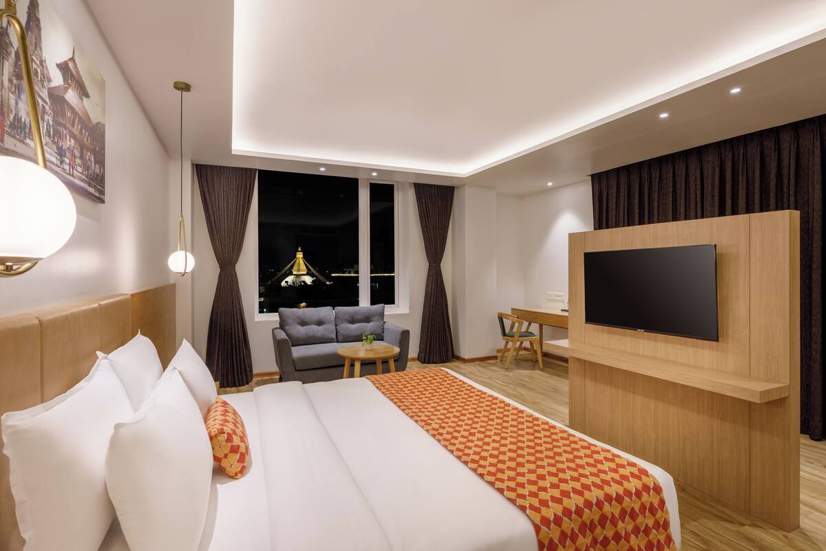 Junior Suite with Stupa view | Pillow-top beds, minibar, in-room safe, desk