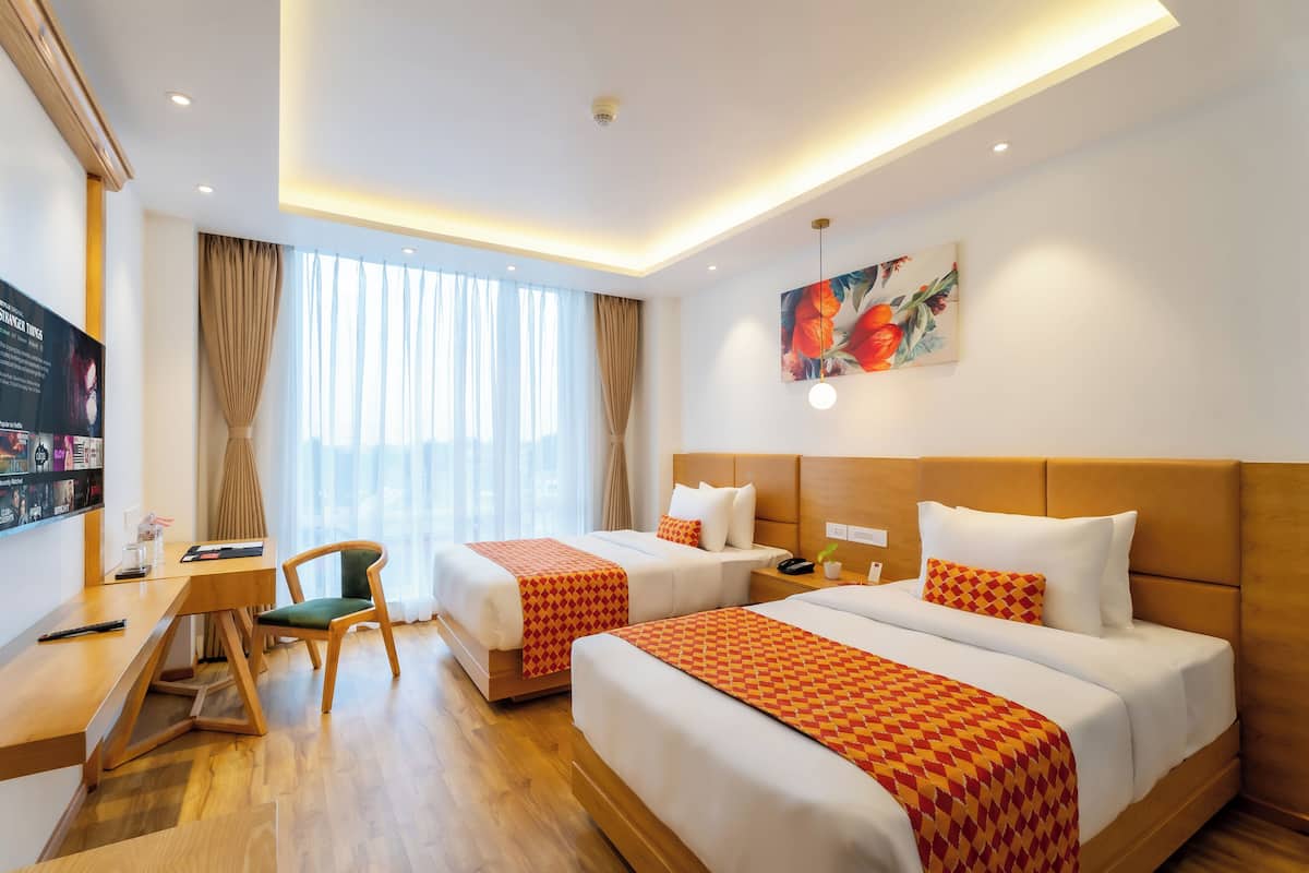Deluxe Room, 2 Twin Beds | 12 bedrooms, pillowtop beds, minibar, in-room safe